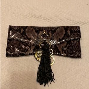 alexisuospny snakeskin clutch